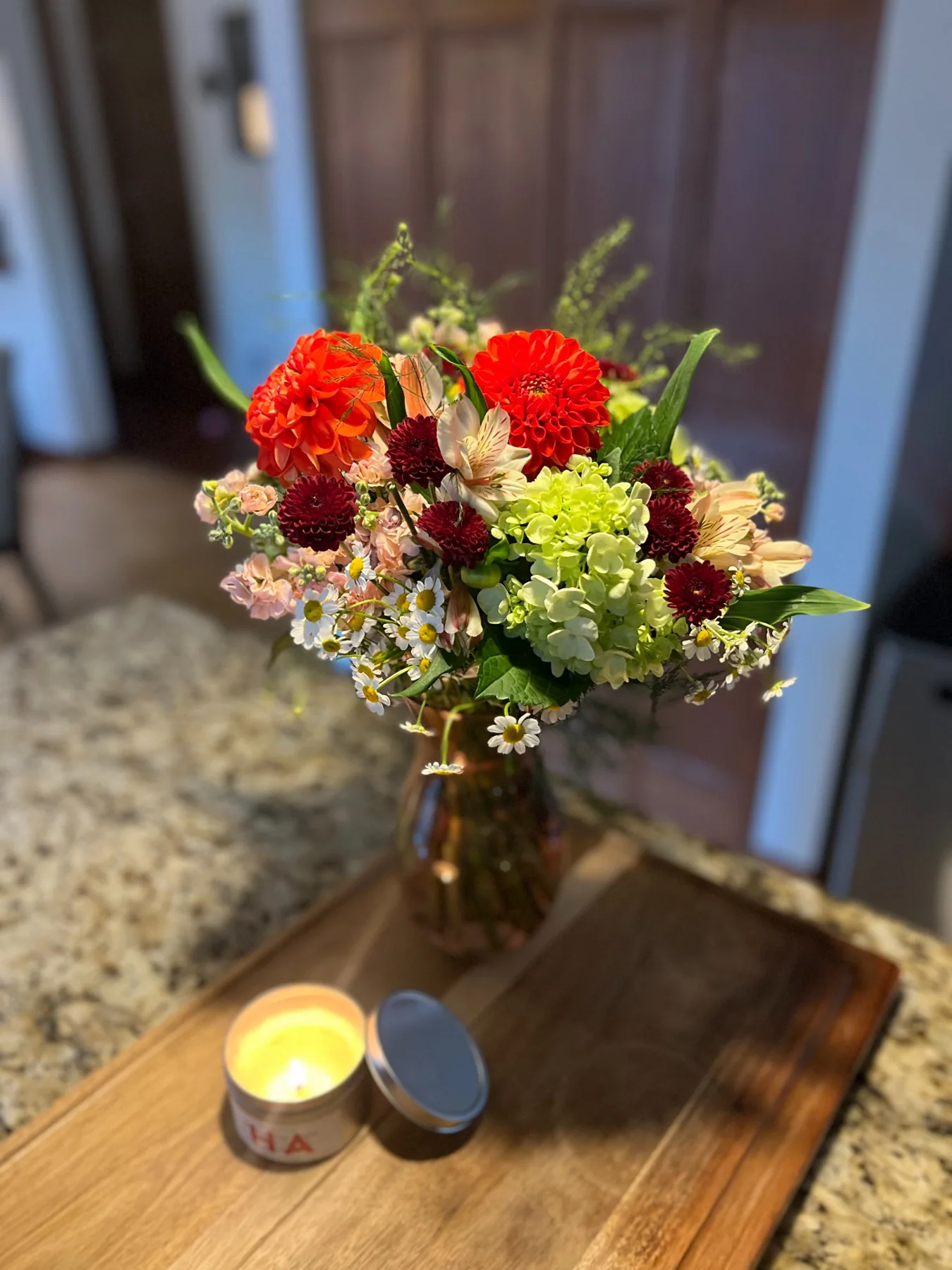 Fresh colorful flowers arranged in a vase